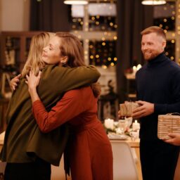 Family embracing at holiday celebration.