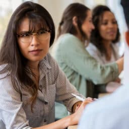 Woman struggling to understand someone