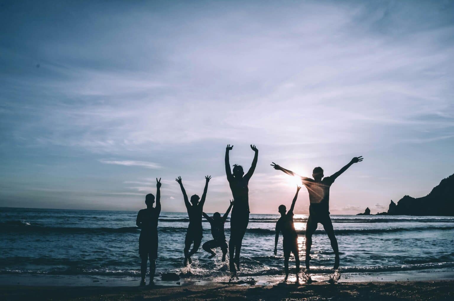 Happy family enjoying a day at the beach